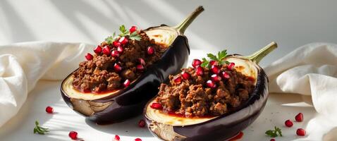 Rustic Eggplants Stuffed with Meat in Red Sauce with Pomegranate Garnish. photo