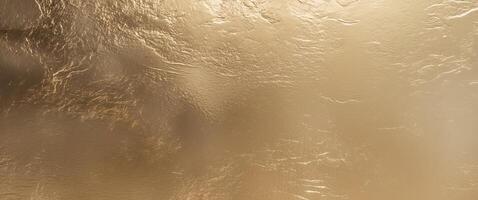 rough shiny brushed gold texture metal background banner. photo