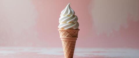 Vanilla Soft Serve Ice Cream Cone on soft pink background. photo