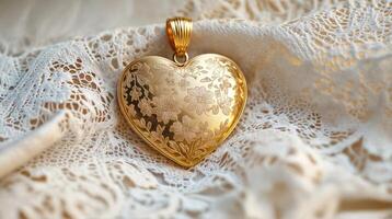 Golden heart shaped pendant resting on delicate lace, symbol of love and affection photo