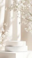 Minimalist Empty white podium mockup displaying acrylic stone, sakura branches spring casting delicate shadows on serene blue background photo