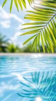 Lush palm leaves mirroring turquoise water ocean, casting peaceful summer reflections across luminous tropical seascape with serene vacation vibes travel background copy space for your text photo
