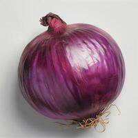 A close-up photograph of a single red onion with its roots still intact, showcasing its vibrant purple color and slightly reflective surface. photo