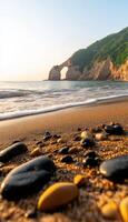 A beach with a rocky shoreline and a mountain in the background photo
