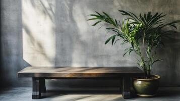 Dark wooden coffee table in a minimalist brutalist design with indoor plant. Wooden coffee table with houseplant photo