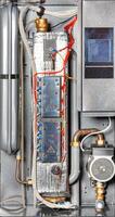 Internal view of an electric boiler with a Wi-Fi module for remote control via the Internet. photo