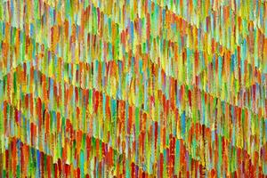The orange hues of the fall trend in a motley abstract color pattern on canvas with a tonal perspective. photo