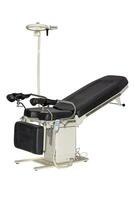Electromechanical operating table with adjustable back support, LED lamp and control panel. photo