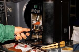 Brewing perfection with precision tools in a bustling cafe environment photo