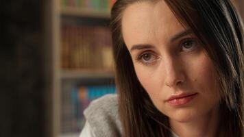 Close up face sad upset Caucasian woman female girl student teacher study learning library school frustrated pensive stressful boring thinking ponder solution university tired college educate problem photo