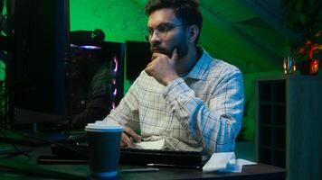 Arabian Indian man programmer error wrong stress male work freelancer guy cryptocurrency loss failure problem trouble difficult deadline nervous code accounts cyber security hacker online search bills photo