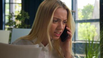 Caucasian businesswoman talk mobile phone arguing negative emotion dissatisfied wrong business contract financial report documents mistake stressed angry entrepreneur girl woman call smartphone shout photo