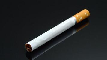 Single Cigarette on Black Background photo