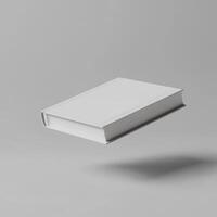 A Single White Book Floating in Mid Air photo