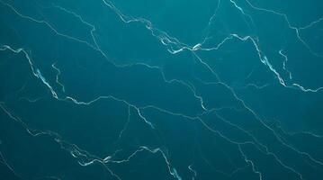 Modern flat design of rich, deep teal marble texture, featuring simple two-dimensional shapes and luxurious vibrant color photo