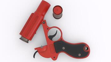 a red gun with a black handle and a red trigger 1 photo
