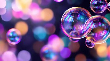 Vibrant iridescent soap bubbles floating against a bokeh background of purple pink and teal lights photo