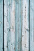 Featuring vertical wooden slats in natural tones, this Nordic-style background promotes tranquility with its soft blue accents and ample space for text overlay, ideal for modern designs photo