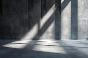Strong steel beams create intersecting shadows across a smooth concrete surface in a spacious area. The dramatic lines enhance the modern architectural feel of the environment photo