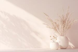 A soft gradient transitions from blush pink to cream with golden hues, featuring minimalist white vases holding dried flowers, creating a calming atmosphere perfect for elegant designs photo