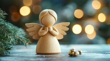 A wooden angel is standing on a table with a tree branch in the background. The angel is holding its wings out to the side and he is praying. The scene has a peaceful and serene mood photo