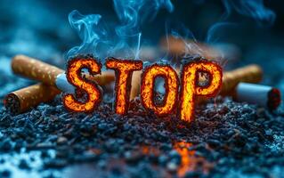 A pile of ash and cigarette butts with the word stop written in the middle. The concept of the image is to convey the negative effects of smoking and the importance of quitting photo