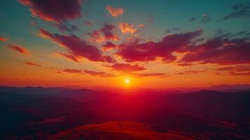Dramatic sunset displays vibrant orange and deep red gradient with dark crimson clouds, creating majestic dusk horizon and ethereal evening glow in tranquil landscape composition. hour photo