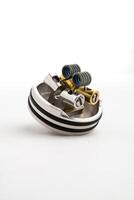 vape vaporizer atomizer RDA deck with twisted mess alien core coil wire close up macro photo on white background