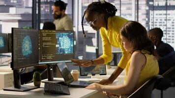 Admin and coworker conducting experiments and tests to optimize AI machine learning models for performance and accuracy. Team of IT experts in office analyzing artificial intelligence data, camera A photo