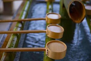 Purification trough at Oomiya hachiman shrine in Tokyo photo