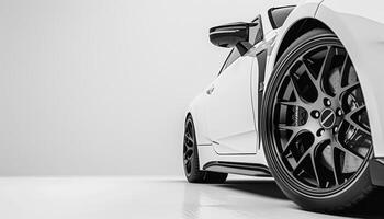 White Car with Black Wheels. photo