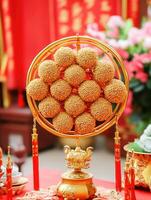 Golden Ornament with Red Tassels. photo