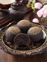 Close-up of Delicious Black Sesame Mochi. photo