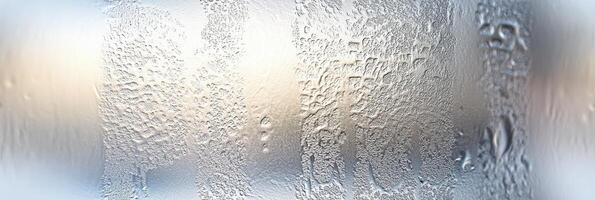 Frosted glass texture with water droplets and subtle light patterns photo