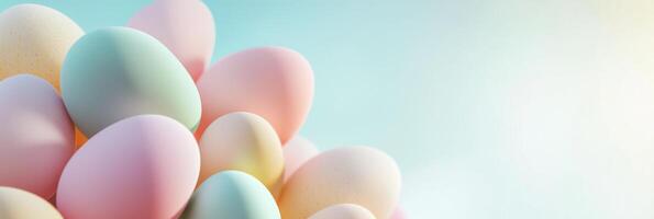 Pastel-colored easter eggs on a soft gradient background for spring theme photo