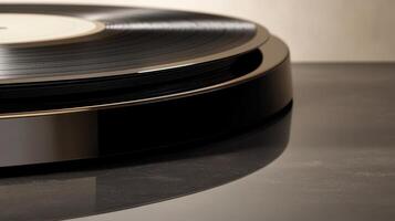 Close-up of vinyl record player with glossy black turntable surface photo