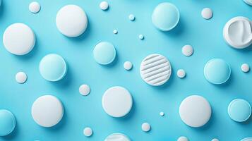 Colorful Circular Shapes in Various Sizes and Textures on a Light Blue Background for Creative Design and Visual Projects photo