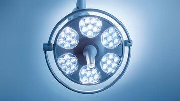 Modern Surgical Light Overhead in a Hospital Operating Room with Bright LED Bulbs Providing Illumination for Precision Surgery Procedures and Medical Treatments photo