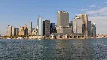 Manhattan Skyline with Waterfront View - A serene cityscape featuring skyscrapers and water video