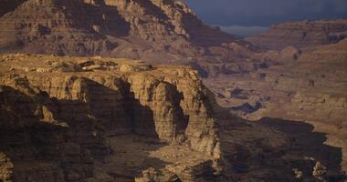 Stunning view of rugged cliffs at sunset in a mountainous landscape video