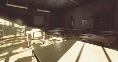Empty classroom with sunlight streaming through windows in afternoon hours video