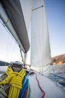 Yacht sailing in Adriatic sea. Close-up view of the deck, mast and sails. Yachting concept. High quality photo