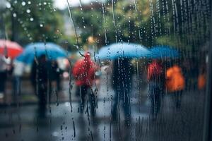Rain droplets cling to window, blurring figures outside, creating a reflective mood photo