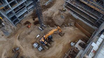 Construction Site with Excavator and Building Framework in Process of Development photo