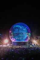 Glowing disco ball with lights in a public park. Chiang Rai, Thailand. photo