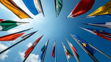 International flags array against blue sky showcasing global unity and cultural diversity photo