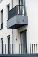 Modern balcony design enhancing urban living in a residential building photo
