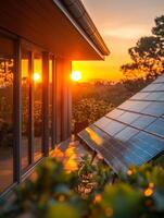 Solar panels on a house at sunset photo