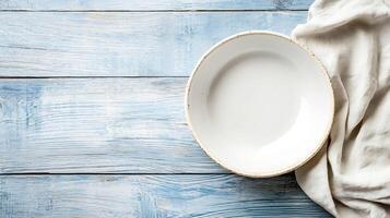 Minimalist Overhead View of White Ceramic Bowl on Rustic Wooden Background with Linen Cloth photo