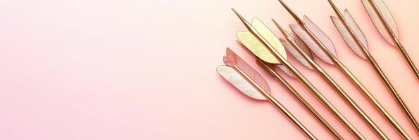 Decorative arrow feathers on pink gradient background for creative projects photo